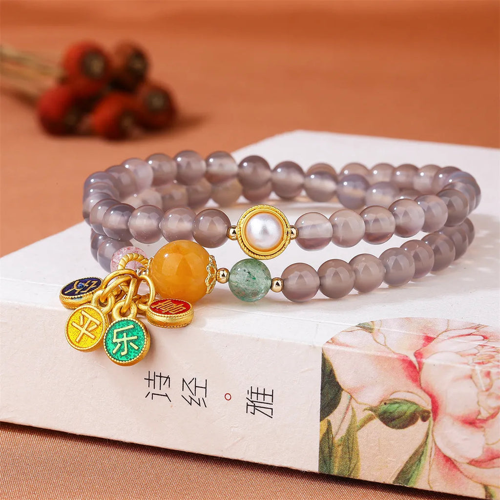 Women's two-circle bracelet made with natural gray agate beads in a retro style.