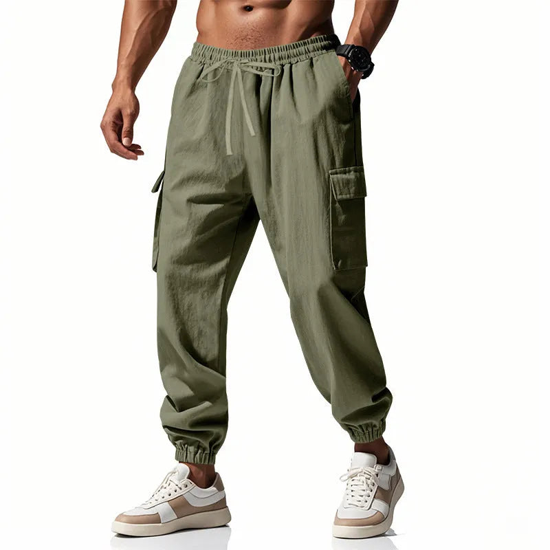 Men's ankle-tied linen trousers in Army Green colour showing multi-pocket design and drawstring waist