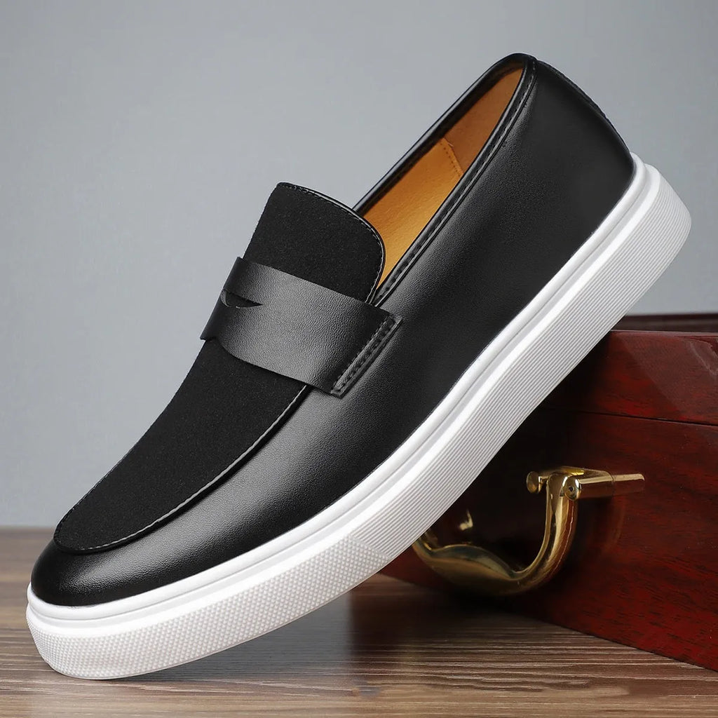 Black men's slip-on casual shoes with tassel detailing and Gommino soles