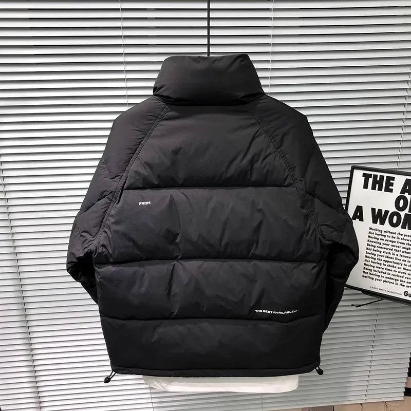 Men's stand collar thick down jacket in solid black colour on a plain background