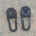 Black zinc alloy outdoor carabiner with integrated compass and thermometer display.