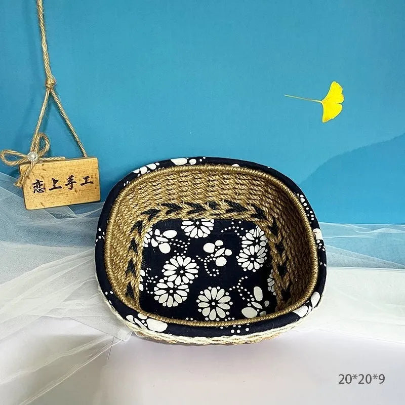 Blue square plastic hand-woven storage basket on a wooden table.
