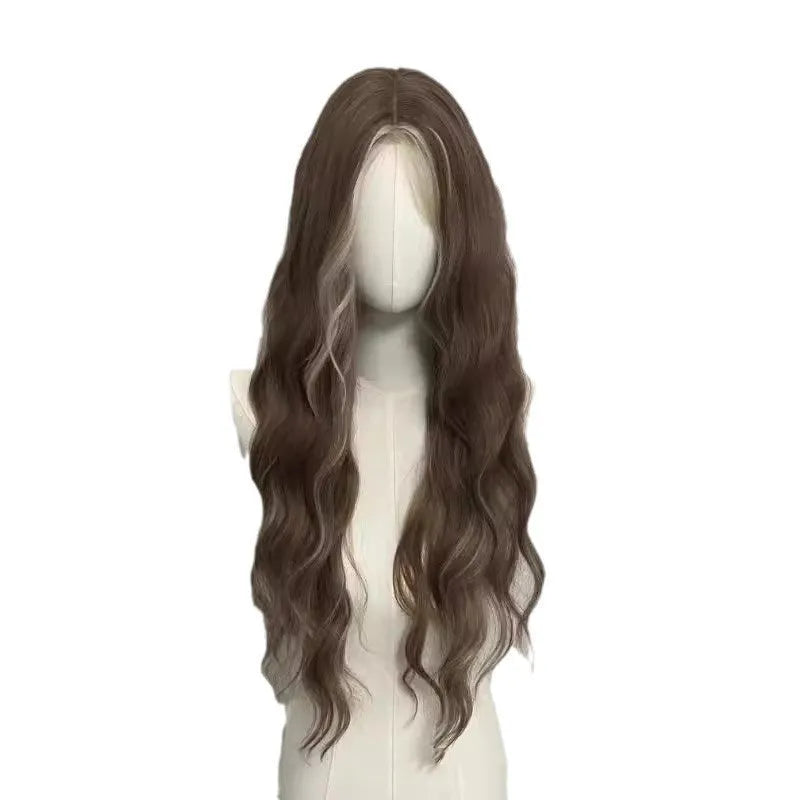 Long curly synthetic wig in gray gold with highlights, shown on a model.