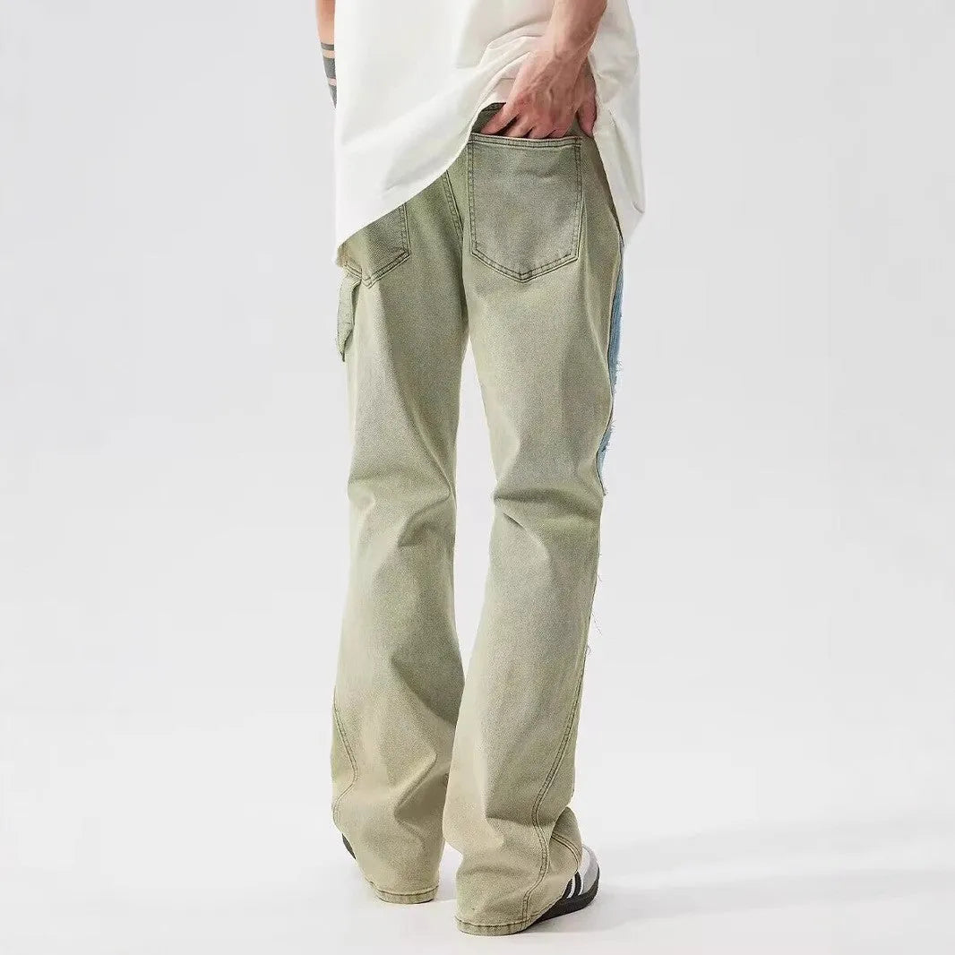 Yellow and blue retro patchwork jeans with splash-ink damaged design on denim