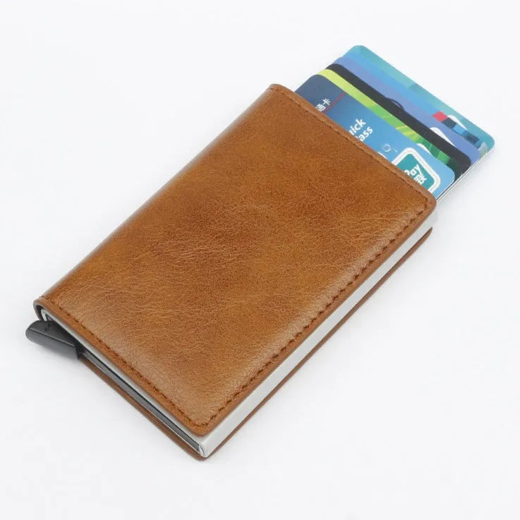 PU aluminium alloy automatic card holder with RFID protection in brown colour, showing pop-up card slot.