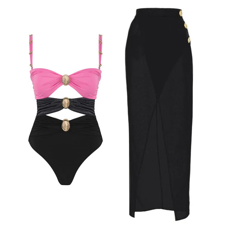 Women's solid colour one-piece swimsuit with an attached short skirt and gold button decoration.