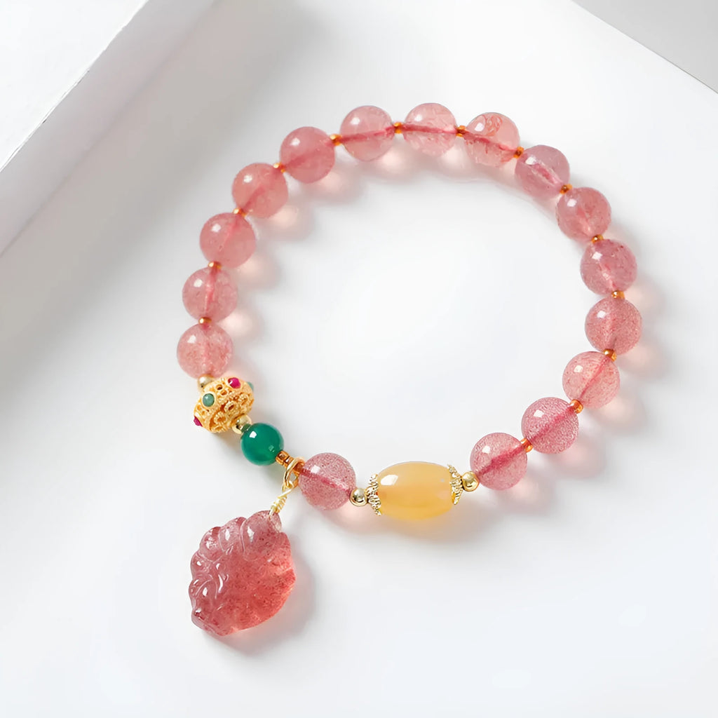 Women's crystal bracelet with strawberry quartz beads and nine tail fox charm