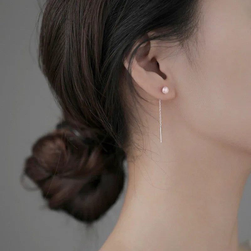 Sterling silver needle ear strings with hanging pearl and geometric designs for female wearers