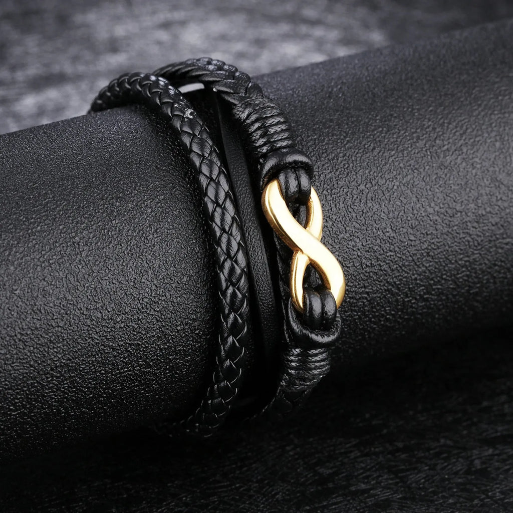 Black vintage leather bracelet with titanium steel clasp on display, 20cm length