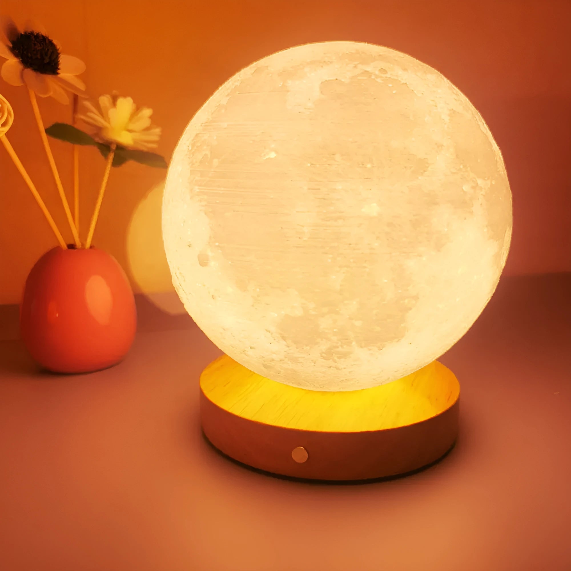Rotating moon night lamp with wooden base showing wireless control and three colour settings