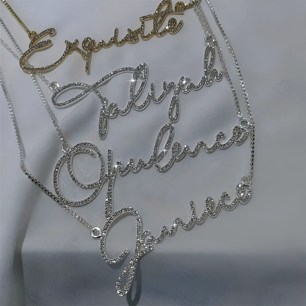 Stainless steel name necklace with diamond-studded English letters on an adjustable chain in gold, rose gold, or silver.