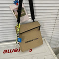 Polyester Oxford messenger bag backpack in street trend style with crossbody design and visible sewing lines