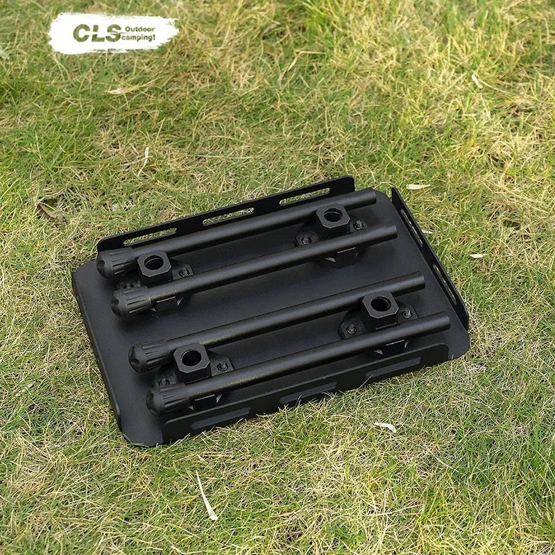 Aluminium alloy dual-use folding camping stool and table with green cushion.