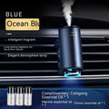 Smart car aroma diffuser clipped onto vehicle air vent in obsidian black colour