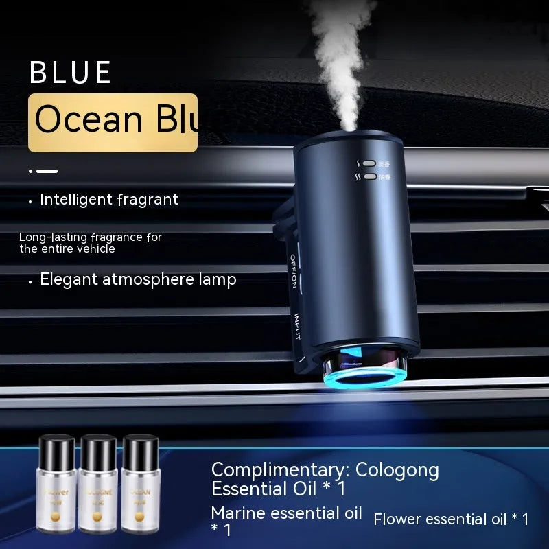 Smart car aroma diffuser clipped onto vehicle air vent in obsidian black colour