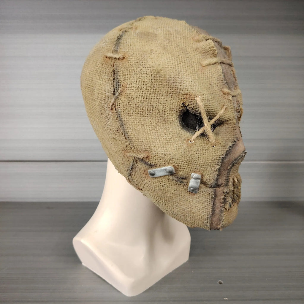 Latex scar skull mask head cover for Halloween and horror costumes.
