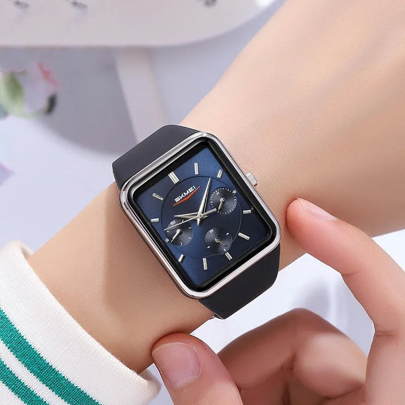 Square silicone waterproof digital watch for girls in multiple colour options on a wrist.