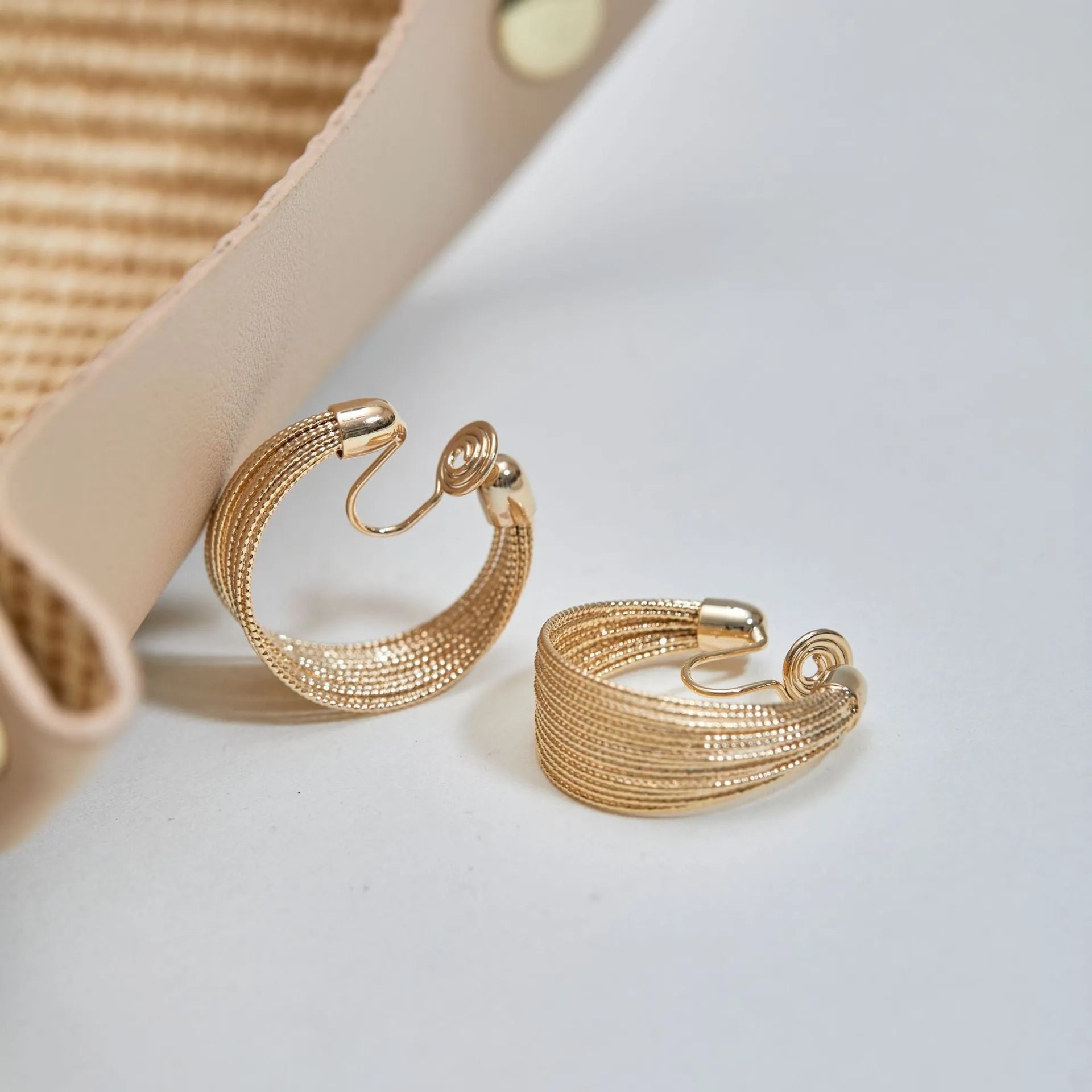 Copper geometric stud and clip earrings with silver and gold electroplated finishes