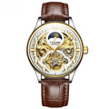 Men's gold leather strap automatic mechanical watch with waterproof case on wrist.