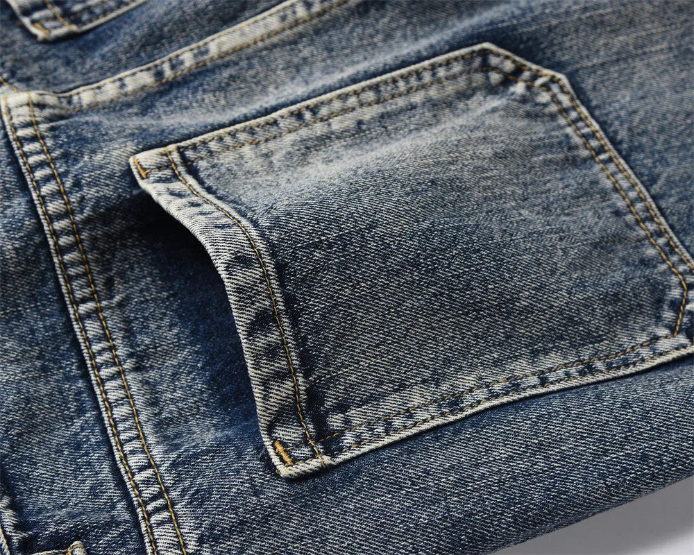 Men's blue denim punk loose straight trousers on a model, casual fit