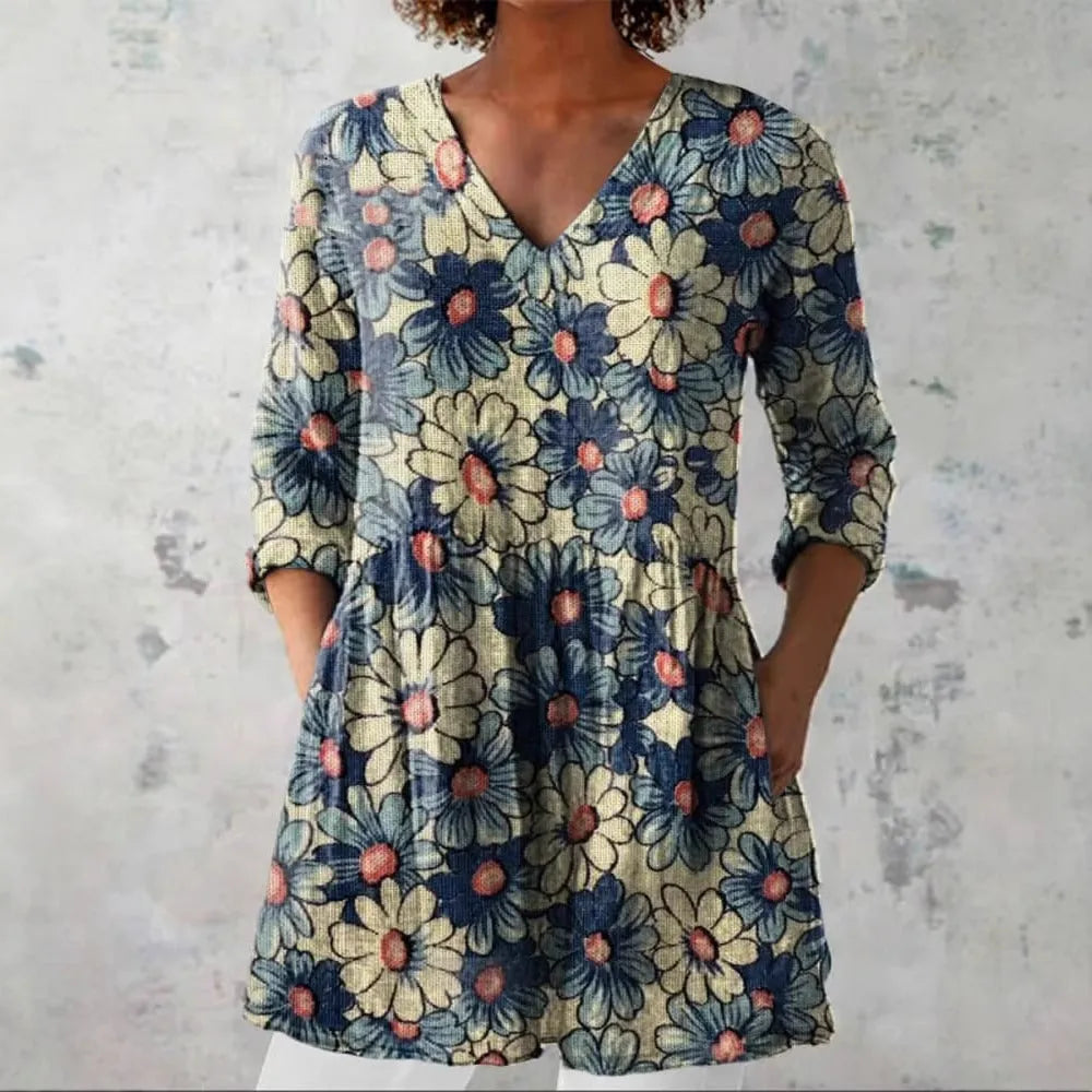 Women's slim fit long-sleeved top with a retro all-over digital print, shown in a selected colour.