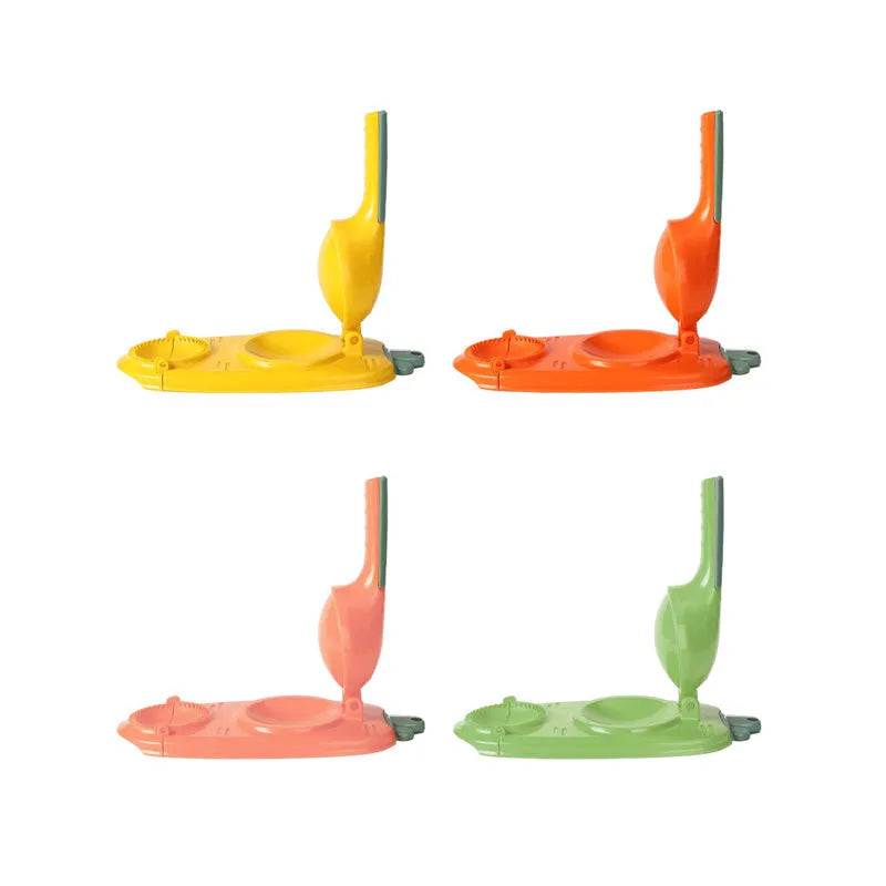 Manual plastic dumpling press tool with ergonomic handle and hanging hole for storage.