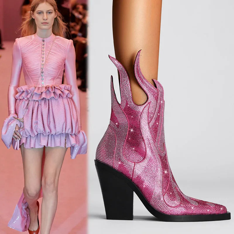 Women's black chunky heel Martin boots with square toe and rhinestone flame decoration.