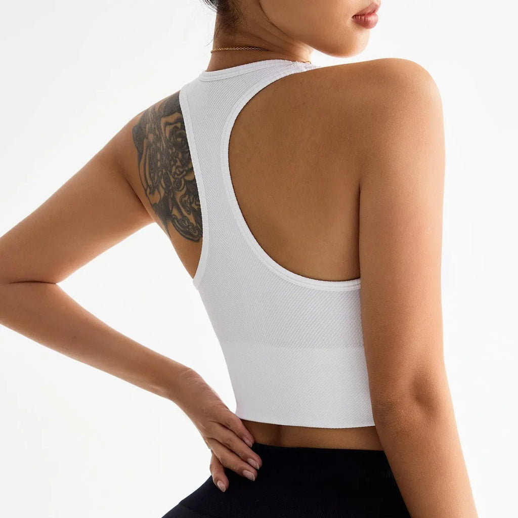 Black women's cross-back sports bra with moulded cups on a mannequin.