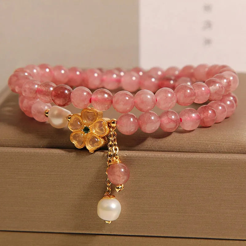 Women's double ring bracelet with strawberry quartz four-leaf clover design in Japanese Korean jewellery style