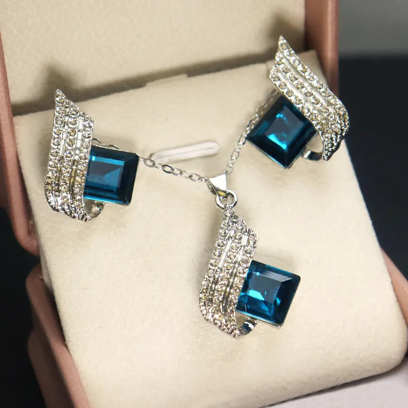 Women's alloy necklace and earring set with glass pendant in European style