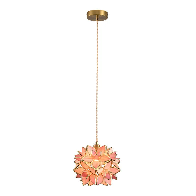 Hanging line lamp chandelier with copper construction and glass elements in bedroom setting