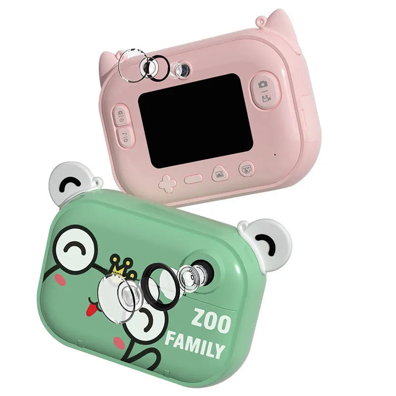Pink instant print digital camera with 2.4-inch LCD screen showing photo preview