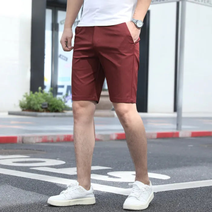 Men's loose elastic waist fifth pants in multiple solid colours with mid-length cut