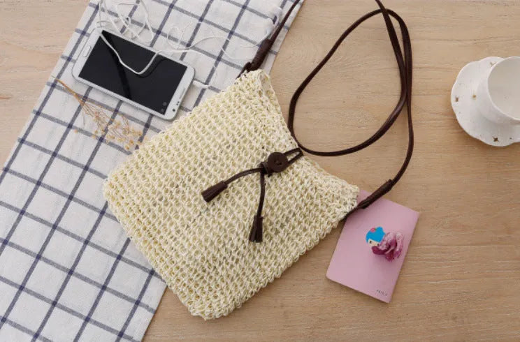 Handmade crochet crossbody straw bag for children with cotton lining in khaki colour