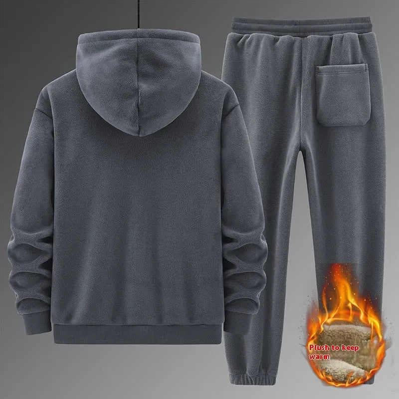 Grey cashmere hooded sweater and cotton pants two-piece sports suit laid flat.