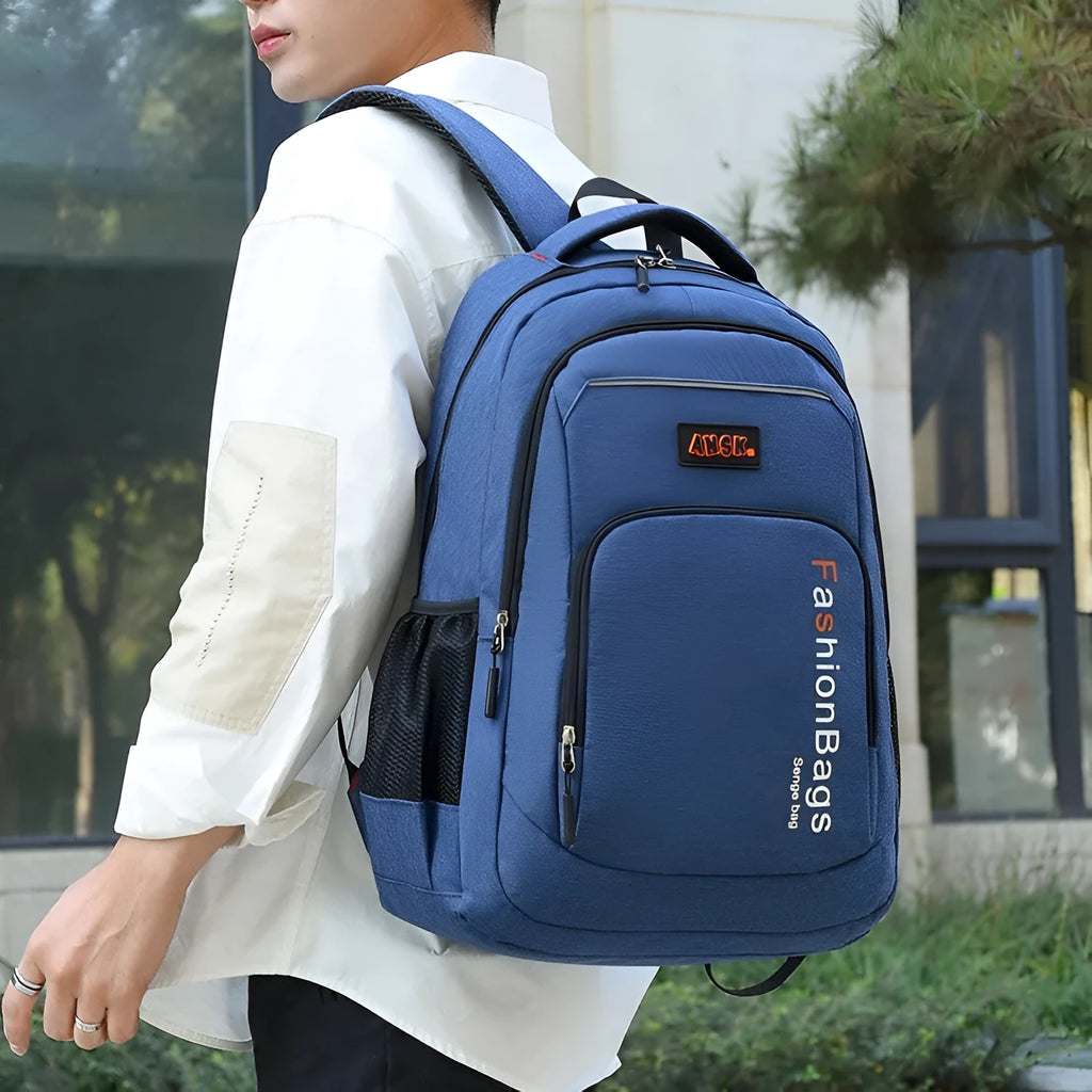 Street style nylon backpack in grey showing internal laptop compartment and organiser pockets.