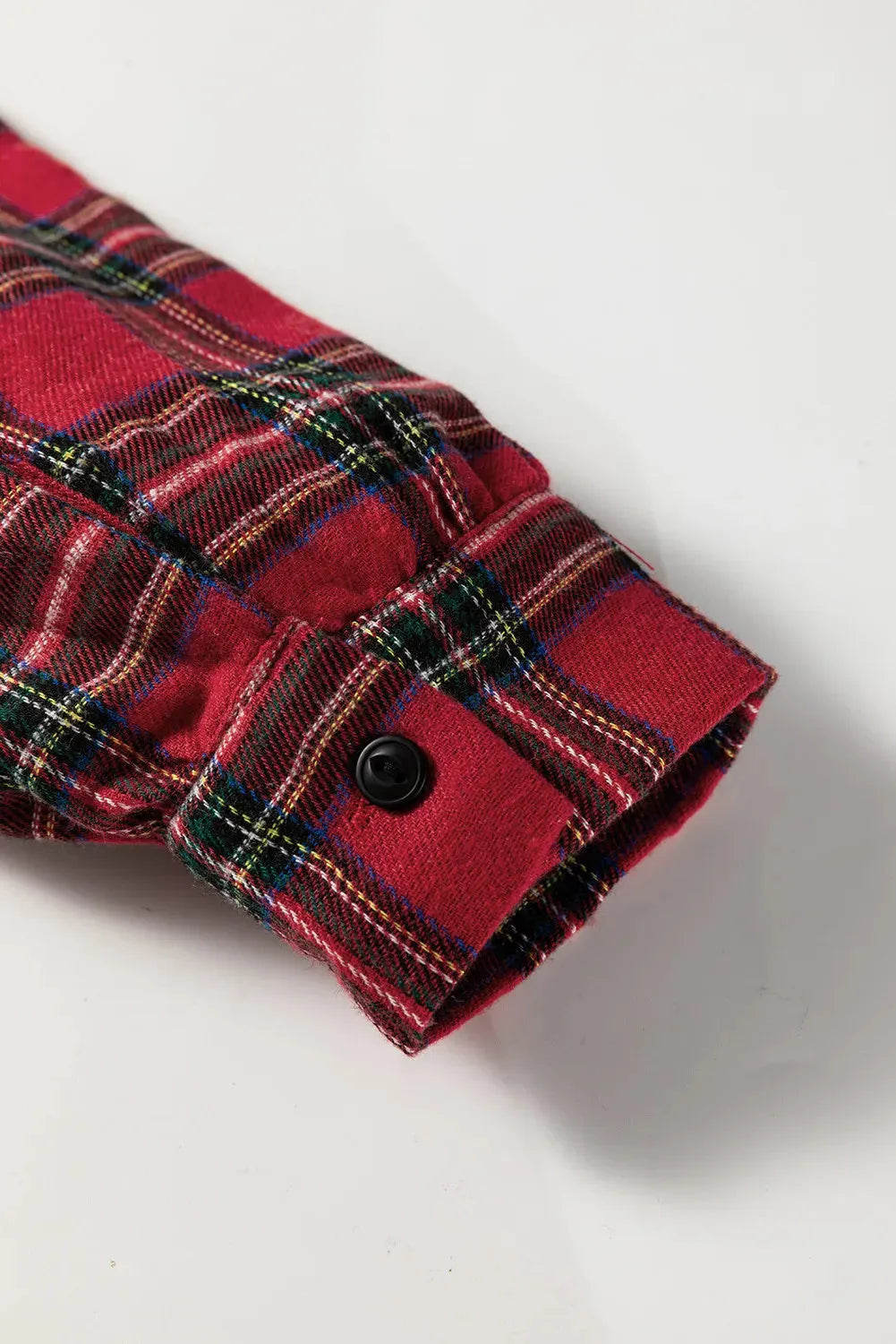 Red and white plaid women's mini dress with a shirt collar, half-button front, long sleeves, and a ruffle hem.