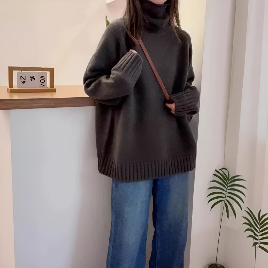 Women's thick turtleneck sweater with curling pile collar in loose fit