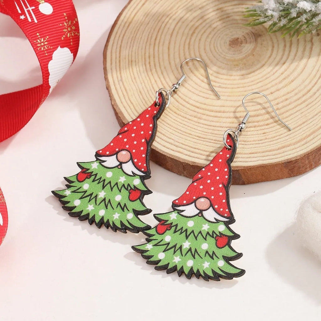 Wooden Christmas earrings with printed tree and snowman designs in festive colours