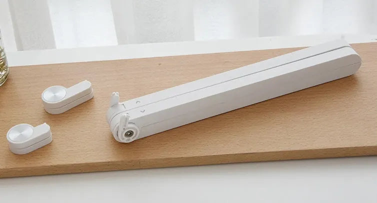 White Whale Race laptop bracket with desktop elevation and integrated heat sink base on desk