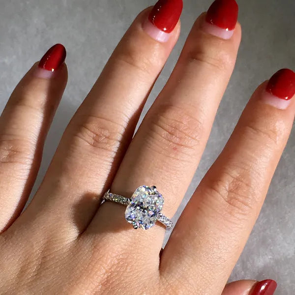 Women's moissanite four-prong princess cut ring in white gold colour on copper band, size no.7