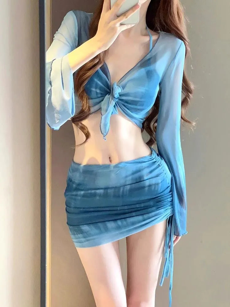 Women's blue high waist bikini four-piece swimsuit set with ruffle skirt