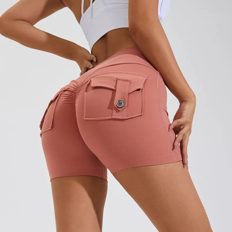 Women's high waist fitness shorts in electric blue colour with side pockets for summer sports