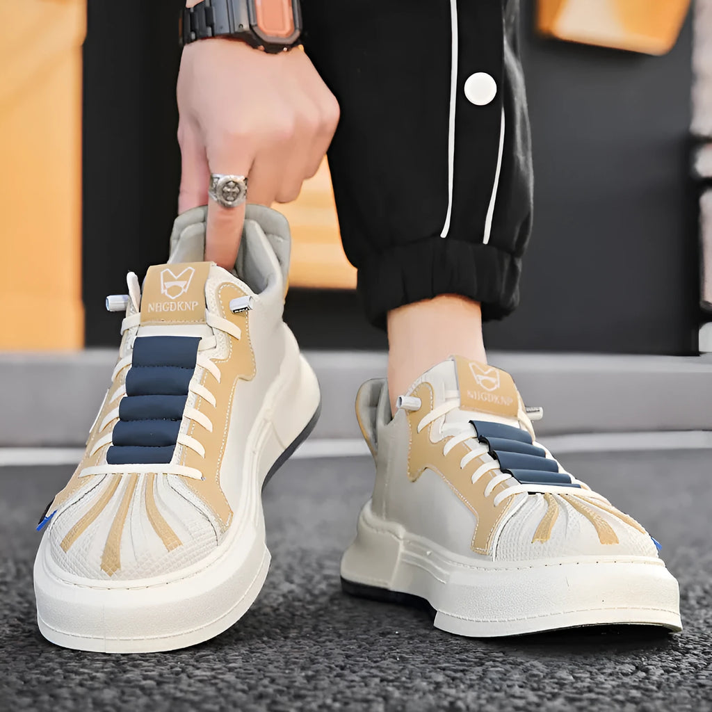 Men's beige low-top sneakers with elastic band and leather stitching on microfiber upper.