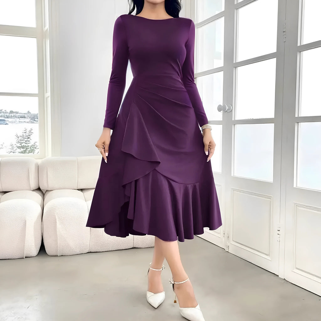 Purple women's long sleeve pullover dress with a round neck and mid waist ruffles.