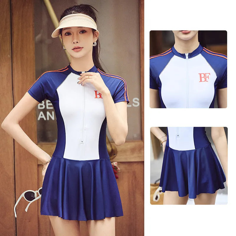 Ladies conservative one-piece swimsuit for sports in a colour-matched pattern.