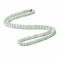 Natural jade bead necklace with round white and green beads on adjustable chain