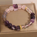 Purple women's amethyst crystal bracelet with rhinestone detailing measuring 10mm diameter