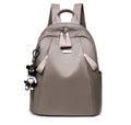 Medium Oxford cloth backpack in grey colour showing interior organisation pockets