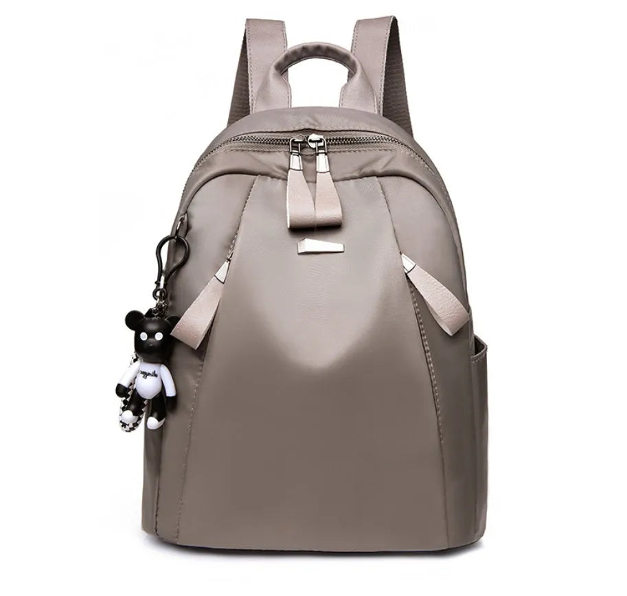 Medium Oxford cloth backpack in grey colour showing interior organisation pockets